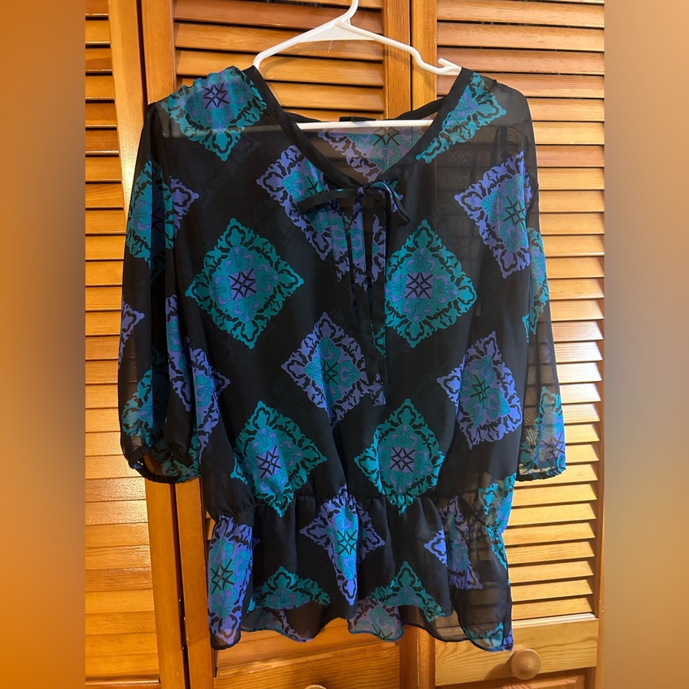 sheer black blouse